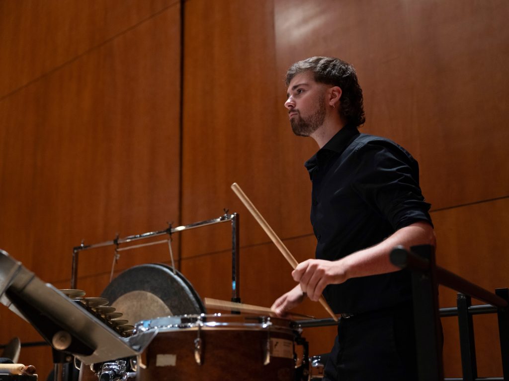 Oier playing toms in the orchestra